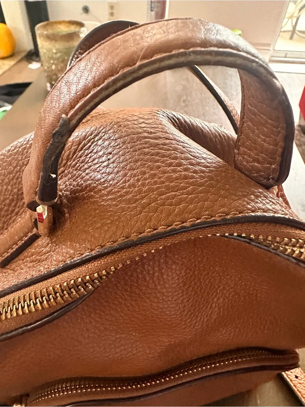 Kate spade pebbled leather mini back pack in camel